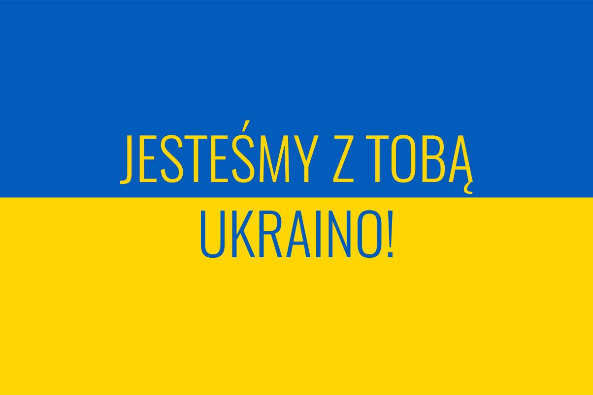 Flaga Ukraimny z napisem: Jesteśmy z Tobą Ukraino!